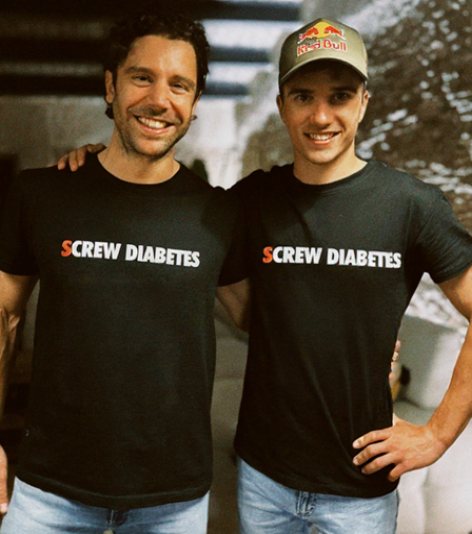 Pedro Dias and Olympic triathlete Vasco Vilaça wearing Screw Diabetes shirts.